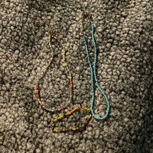 A bracelet and 2 necklaces